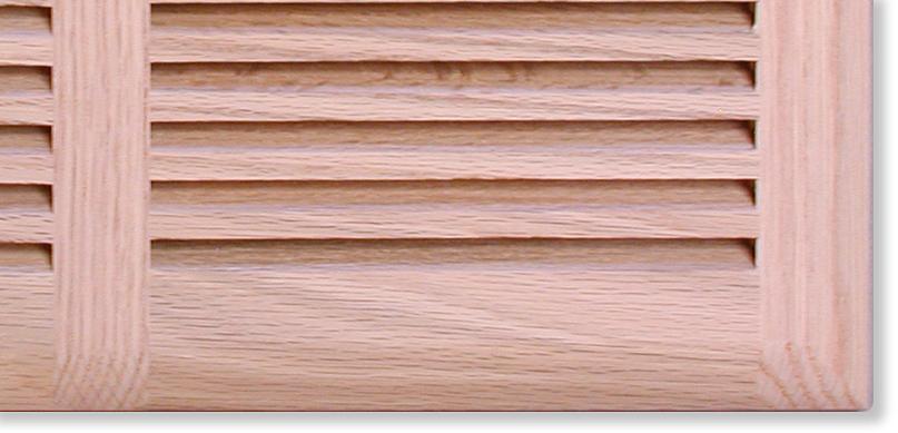 closeup view louvered wood vent cover