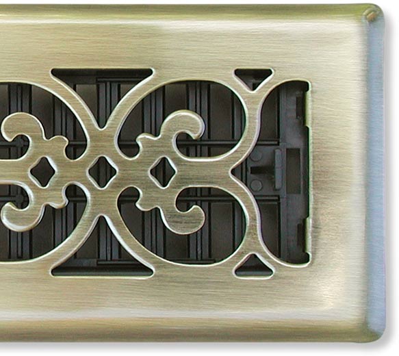 Victorian vent cover in antique brass closeup